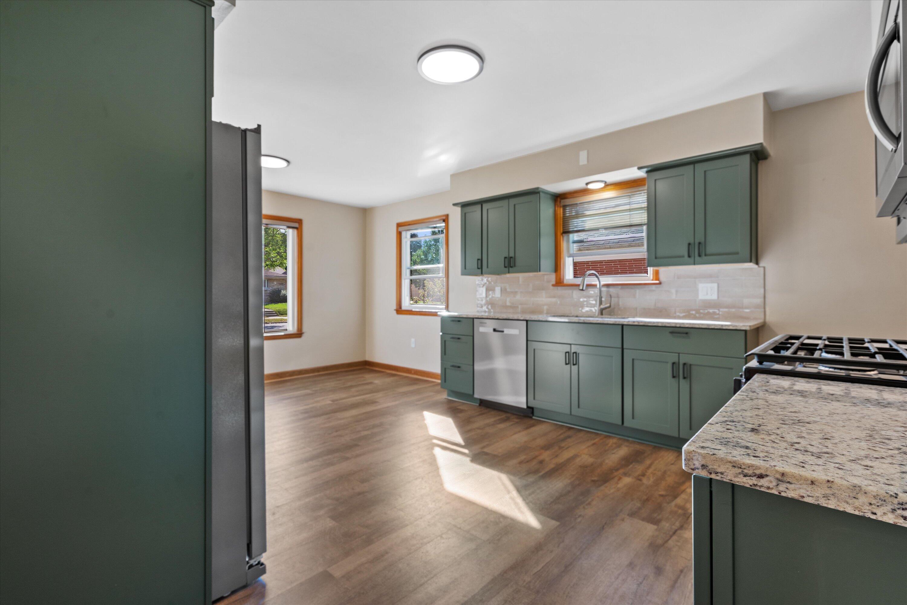 3251 North 94th Street Milwaukee, WI 53222 - Photo 5 of 29 NEW Cabinets, Granite Counters, Flooring & Paint