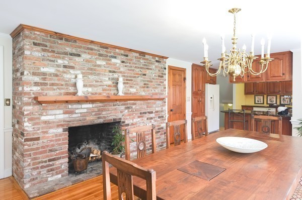 123 Draper Road Wayland, MA 01778 - Photo 11 of 30 a view of a dining room with furniture