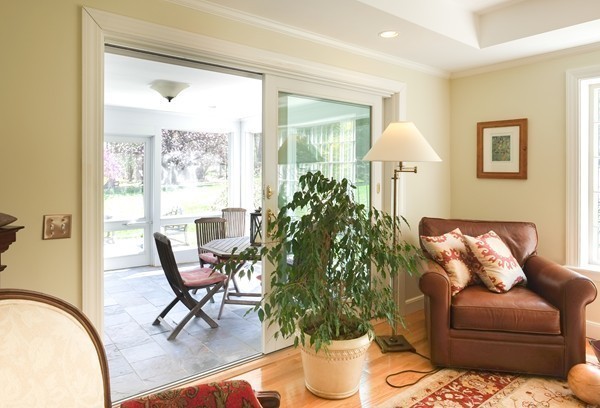 123 Draper Road Wayland, MA 01778 - Photo 12 of 30 a living room with furniture and a window