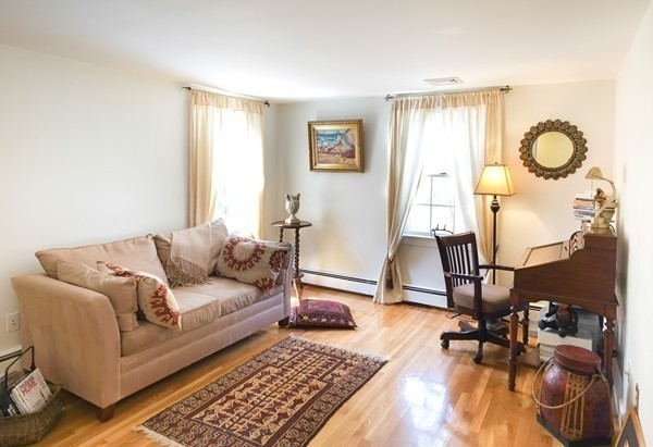 123 Draper Road Wayland, MA 01778 - Photo 22 of 30 a living room with furniture and a mirror