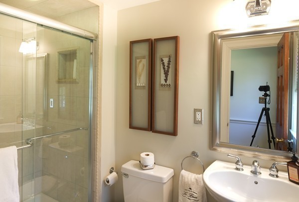 123 Draper Road Wayland, MA 01778 - Photo 24 of 30 a bathroom with a toilet sink and shower