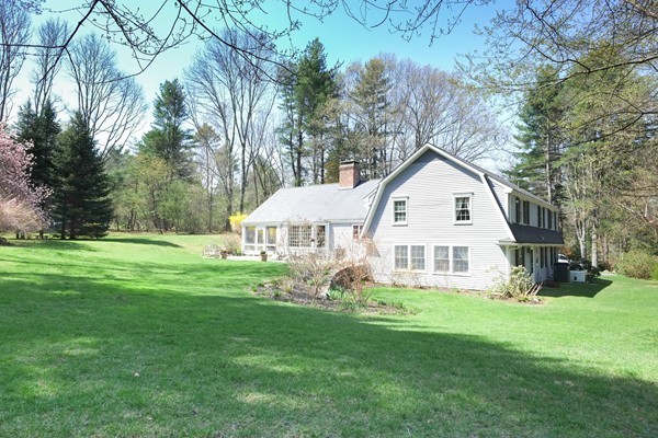 123 Draper Road Wayland, MA 01778 - Photo 26 of 30 a view of a house with a yard