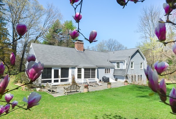123 Draper Road Wayland, MA 01778 - Photo 30 of 30 a front view of a house with garden