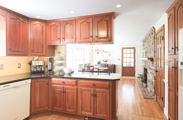 123 Draper Road Wayland, MA 01778 - Photo 9 of 30 a kitchen with stainless steel appliances granite countertop a refrigerator and sink
