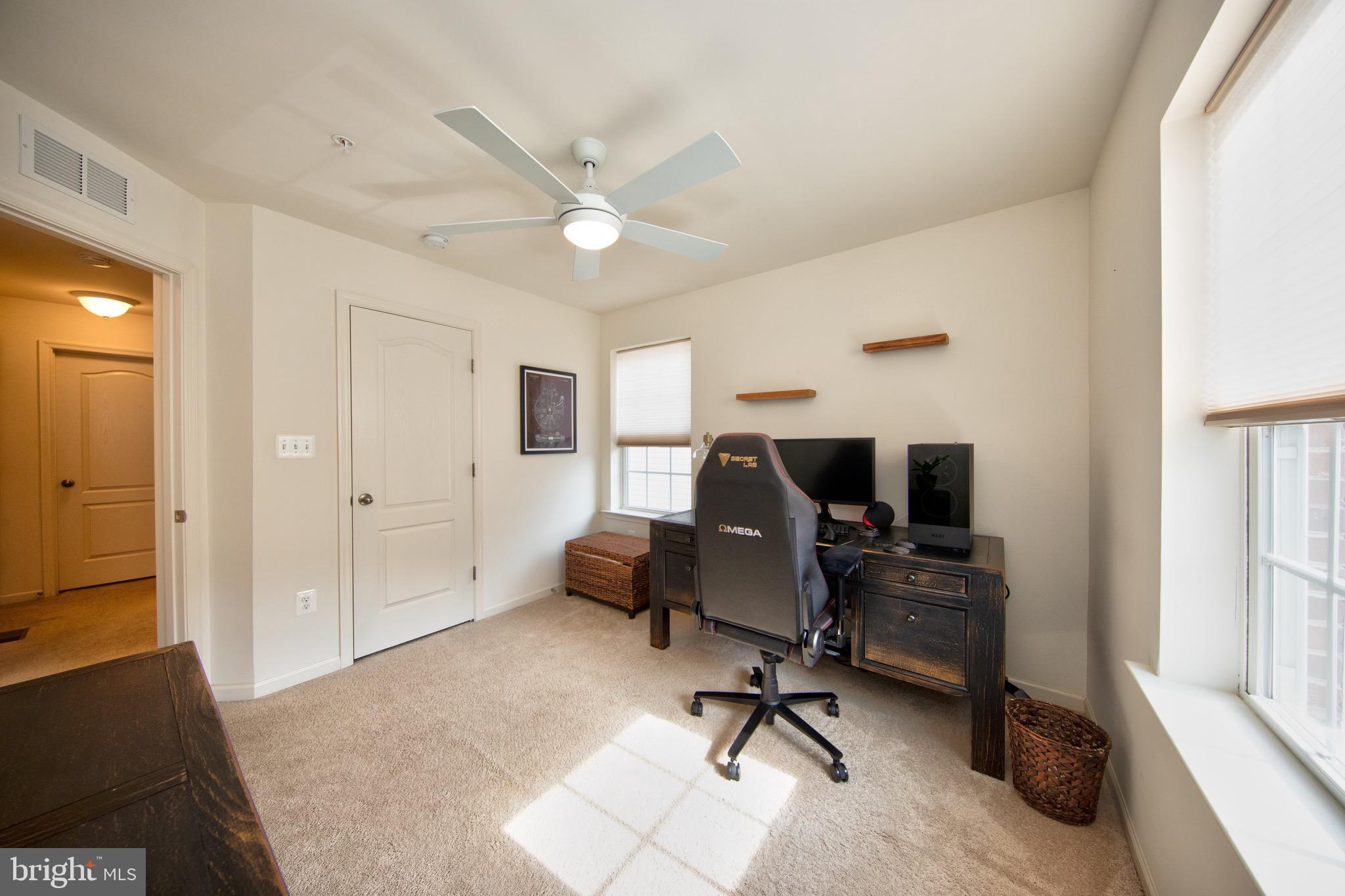 909 Morgan Run Road Baltimore, MD 21220 - Photo 25 of 41 a view of a workspace with furniture and a window