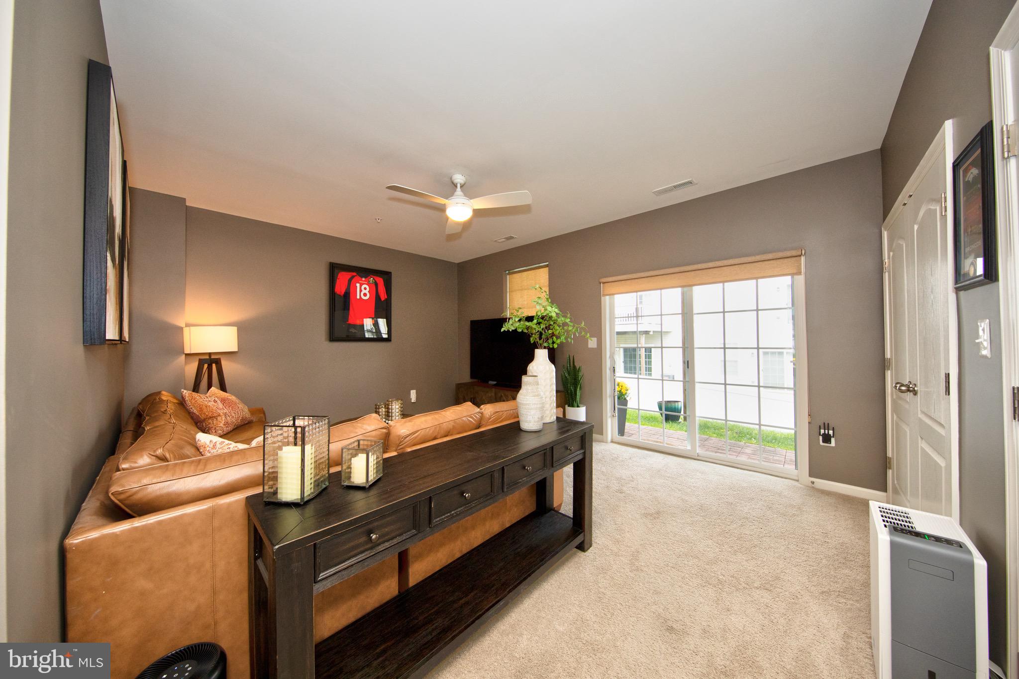 909 Morgan Run Road Baltimore, MD 21220 - Photo 5 of 41 a bed room with a bed and a tv
