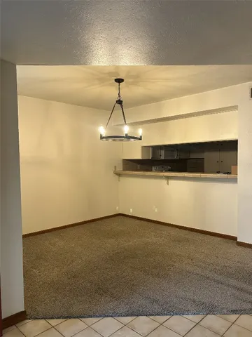 a view of a room with an empty space