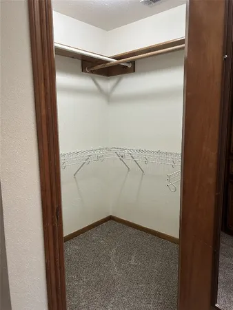 a bathroom with a tub and toilet
