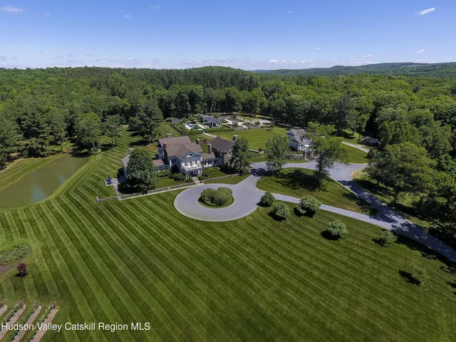 a view of swimming pool from a backyard