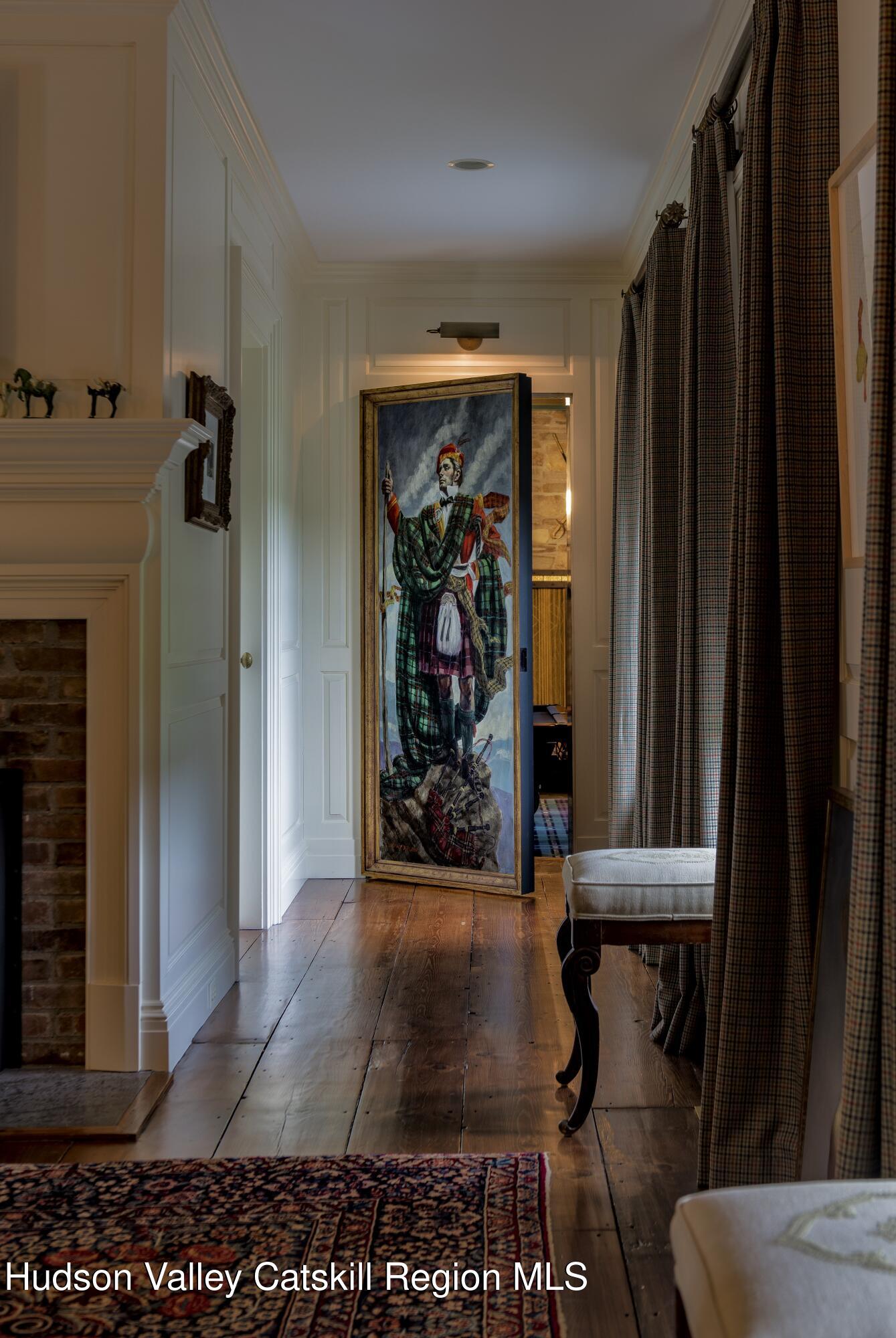 309 Woodstock Road Millbrook, NY 12545 - Photo 12 of 51 a view of a hallway with a living room