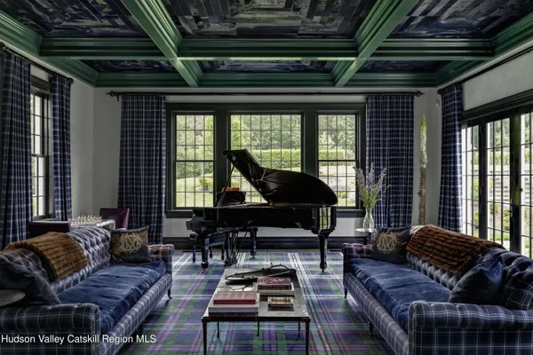 a view of a livingroom with furniture