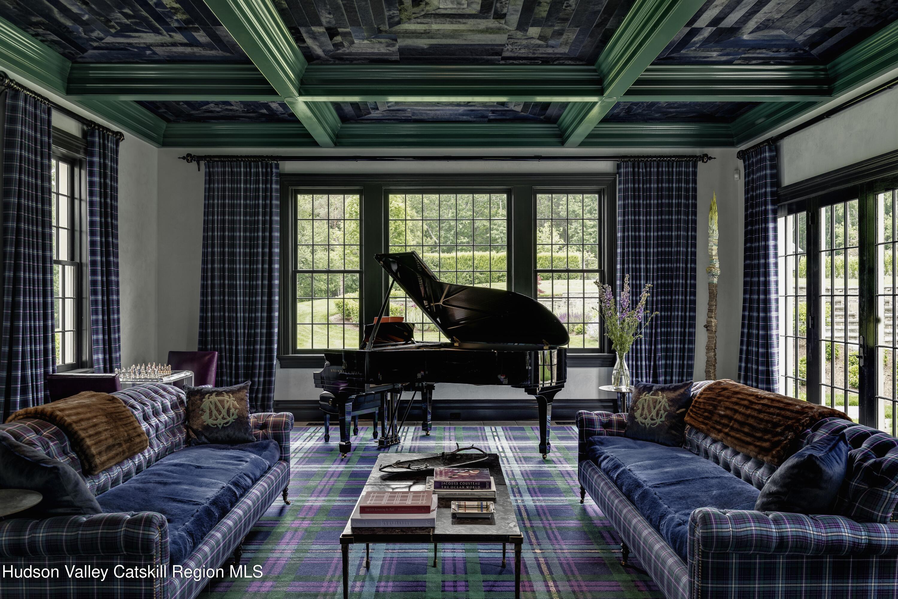 309 Woodstock Road Millbrook, NY 12545 - Photo 13 of 51 a living room with furniture and a large window