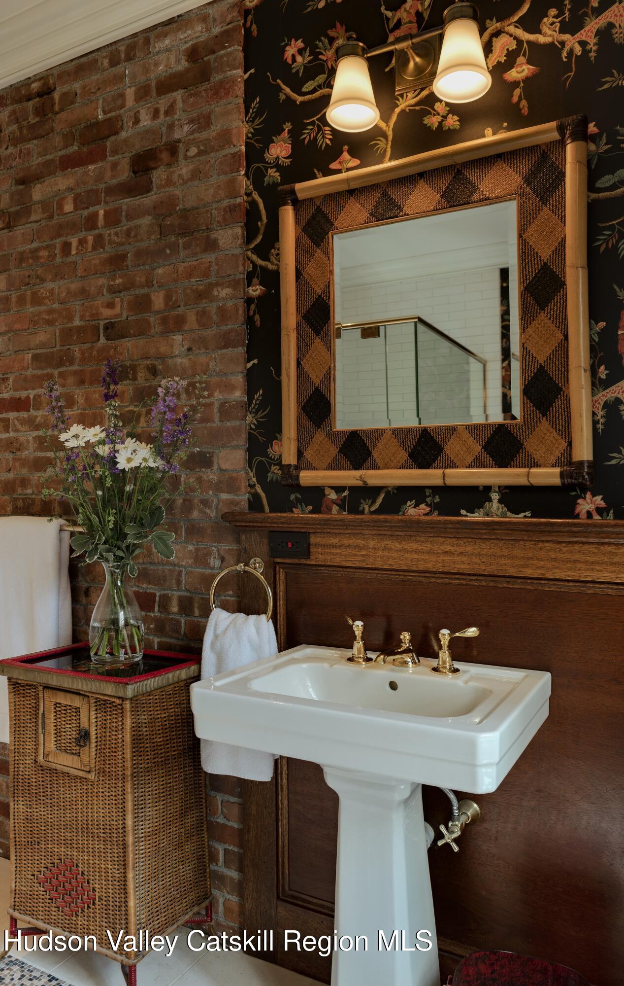309 Woodstock Road Millbrook, NY 12545 - Photo 21 of 51 a bathroom with a sink and a mirror