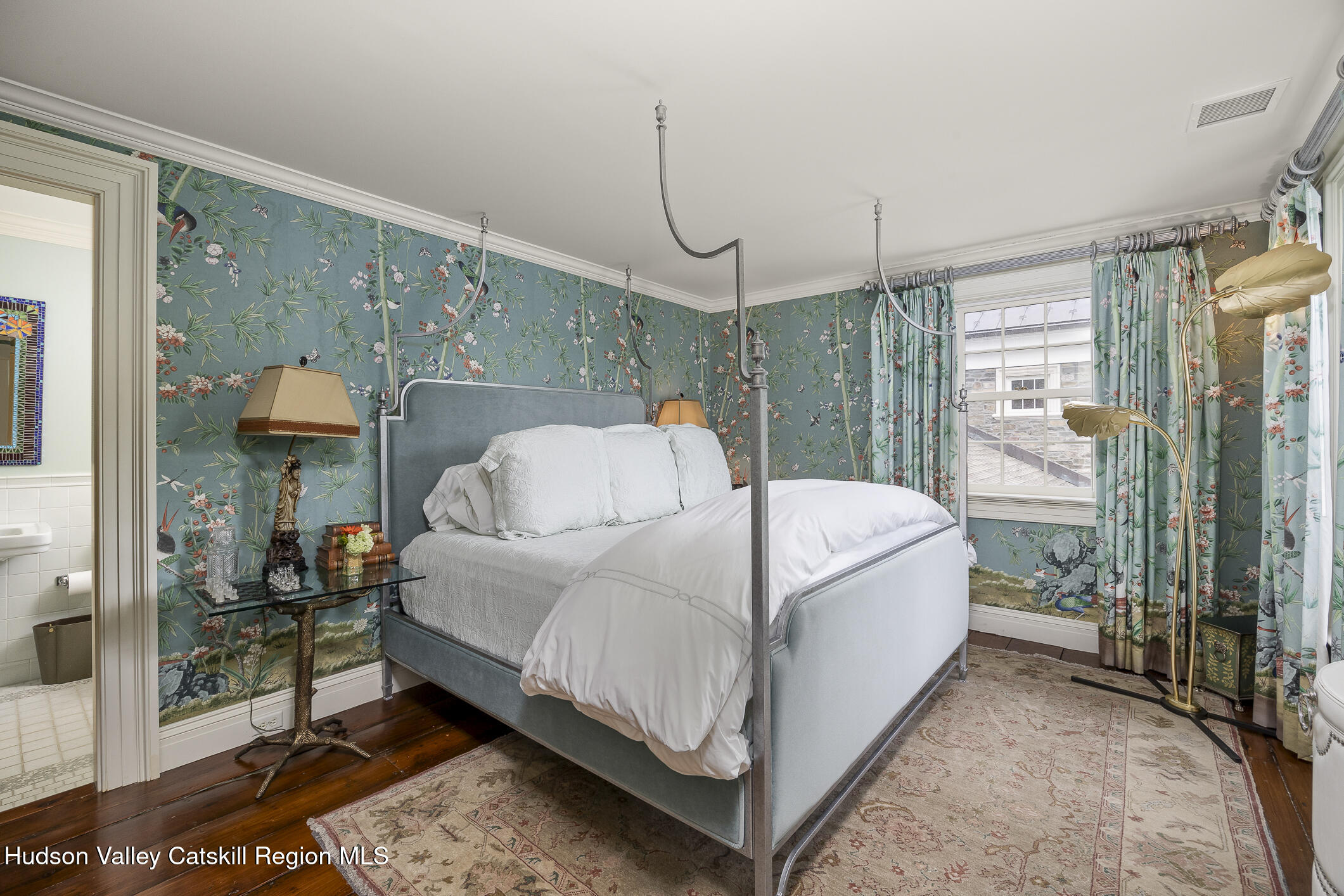309 Woodstock Road Millbrook, NY 12545 - Photo 26 of 51 a white bed sitting in a room next to a window