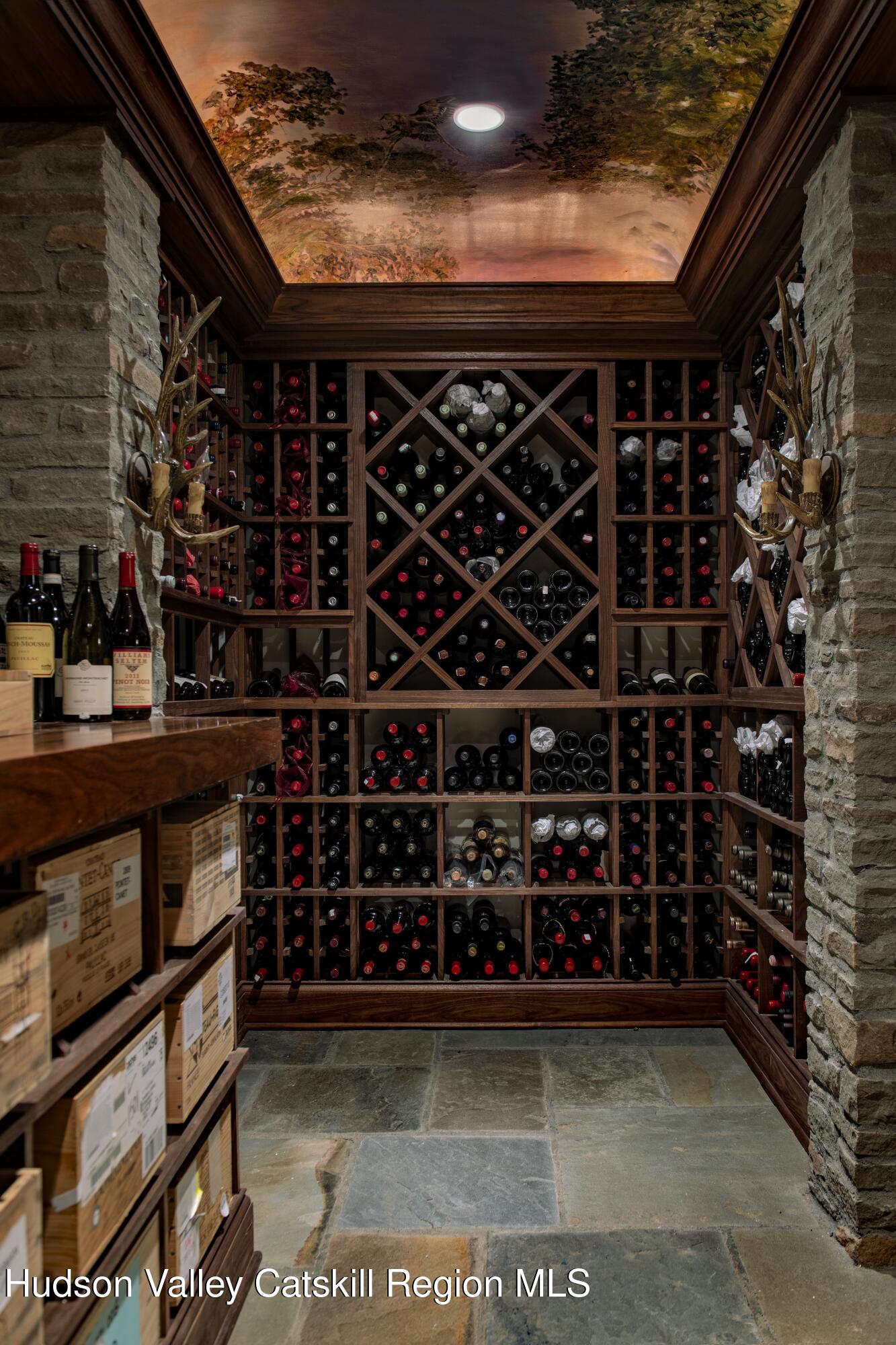309 Woodstock Road Millbrook, NY 12545 - Photo 28 of 51 a view of a wine cellar