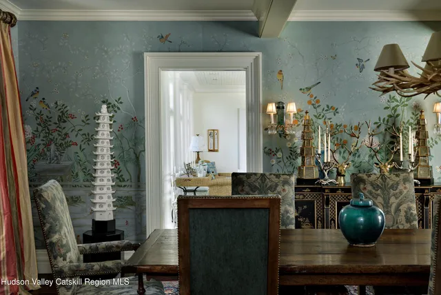 a living room with furniture and windows