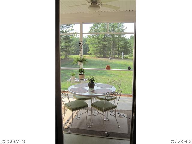 11928 Winterpock Road Chesterfield, VA 23838 - Photo 11 of 12 a dining room with furniture and a window