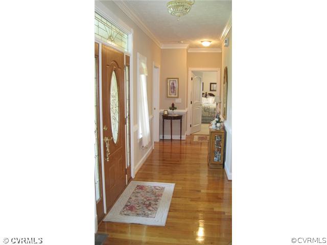 11928 Winterpock Road Chesterfield, VA 23838 - Photo 2 of 12 a bathroom with a sink and a mirror