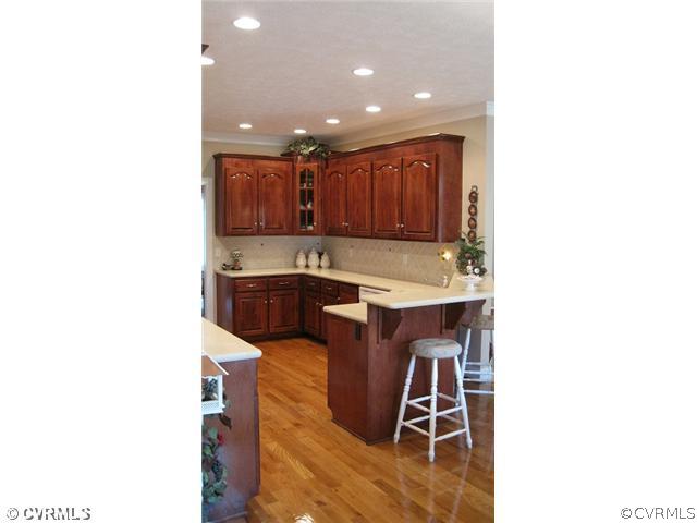 11928 Winterpock Road Chesterfield, VA 23838 - Photo 3 of 12 a kitchen with a sink and cabinets