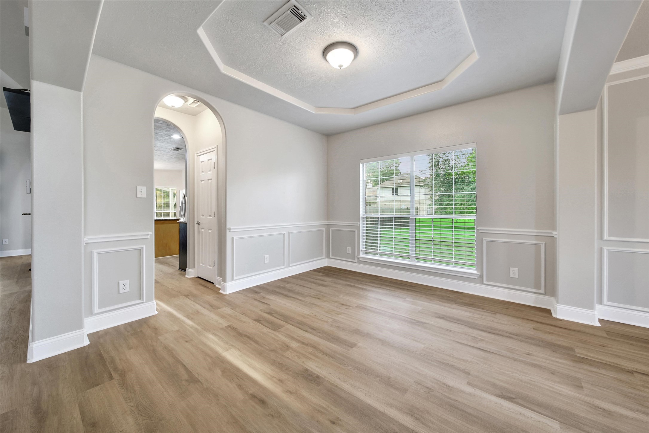 2315 Legends Gate Drive Spring, TX 77386 - Photo 15 of 50 wooden floor in an empty room with a window