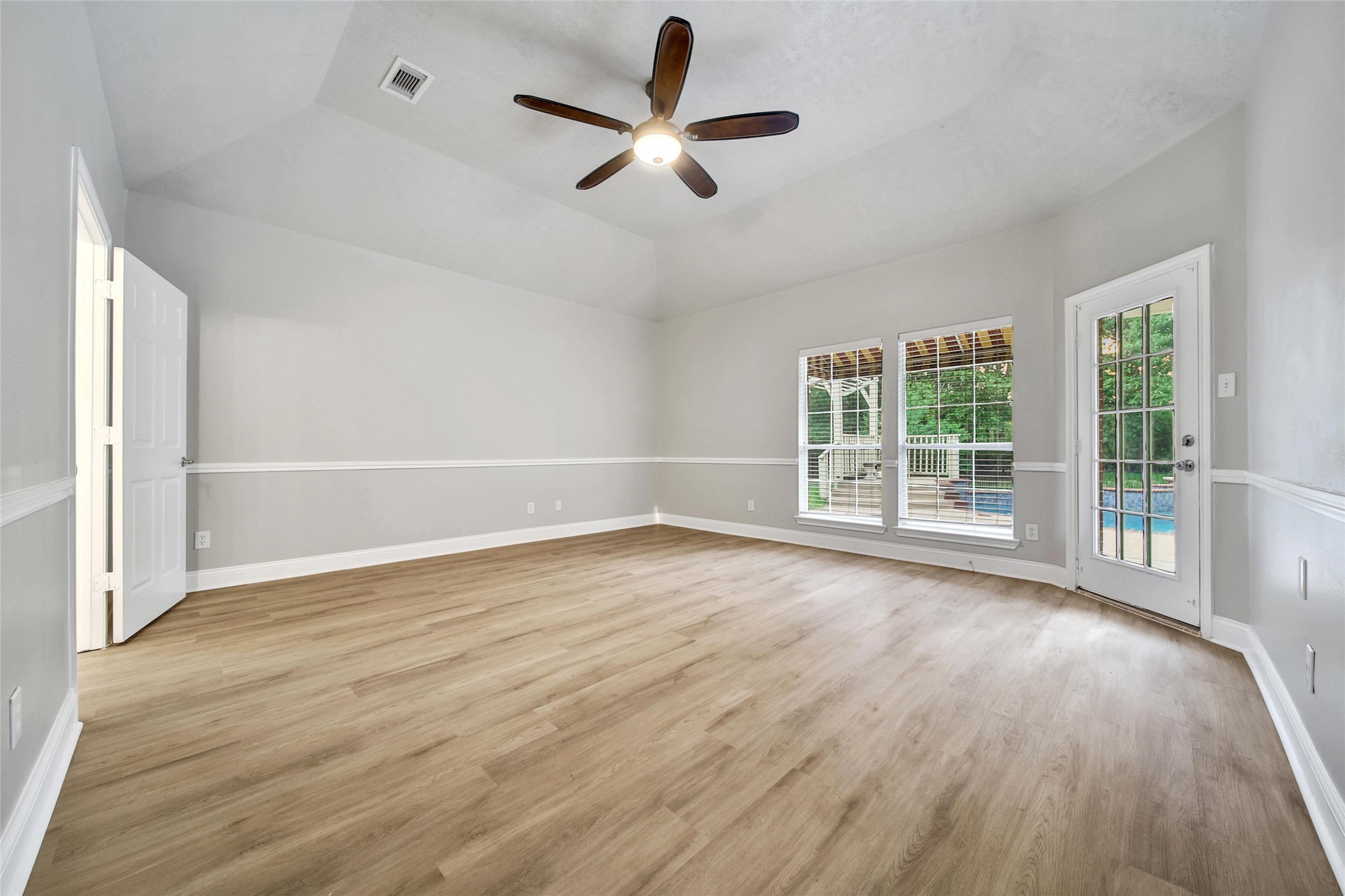 2315 Legends Gate Drive Spring, TX 77386 - Photo 17 of 50 wooden floor in an empty room with a window