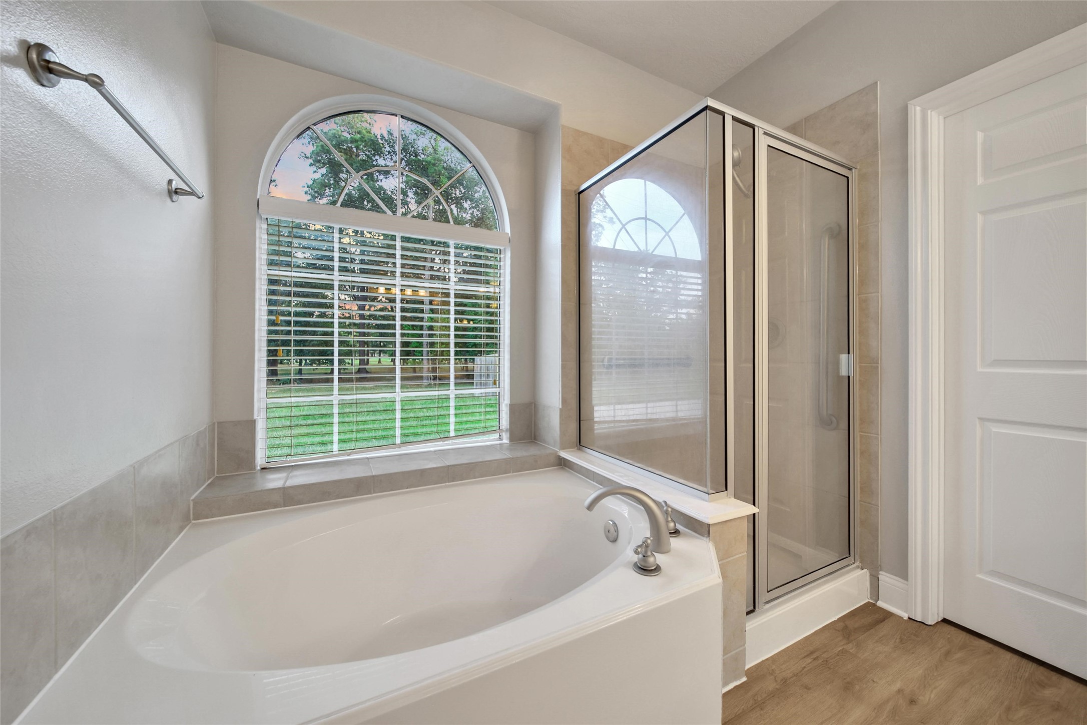 2315 Legends Gate Drive Spring, TX 77386 - Photo 21 of 50 a bathroom with a bathtub and a shower