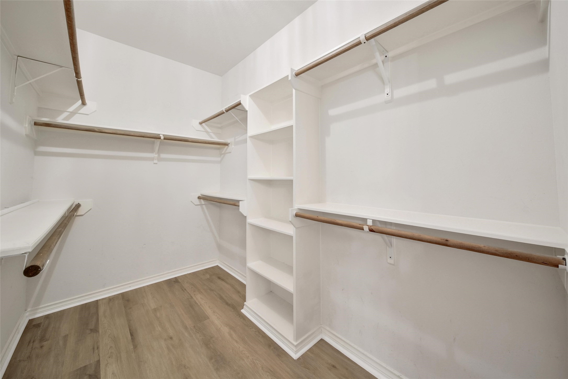 2315 Legends Gate Drive Spring, TX 77386 - Photo 22 of 50 a view of walk in closet with empty racks