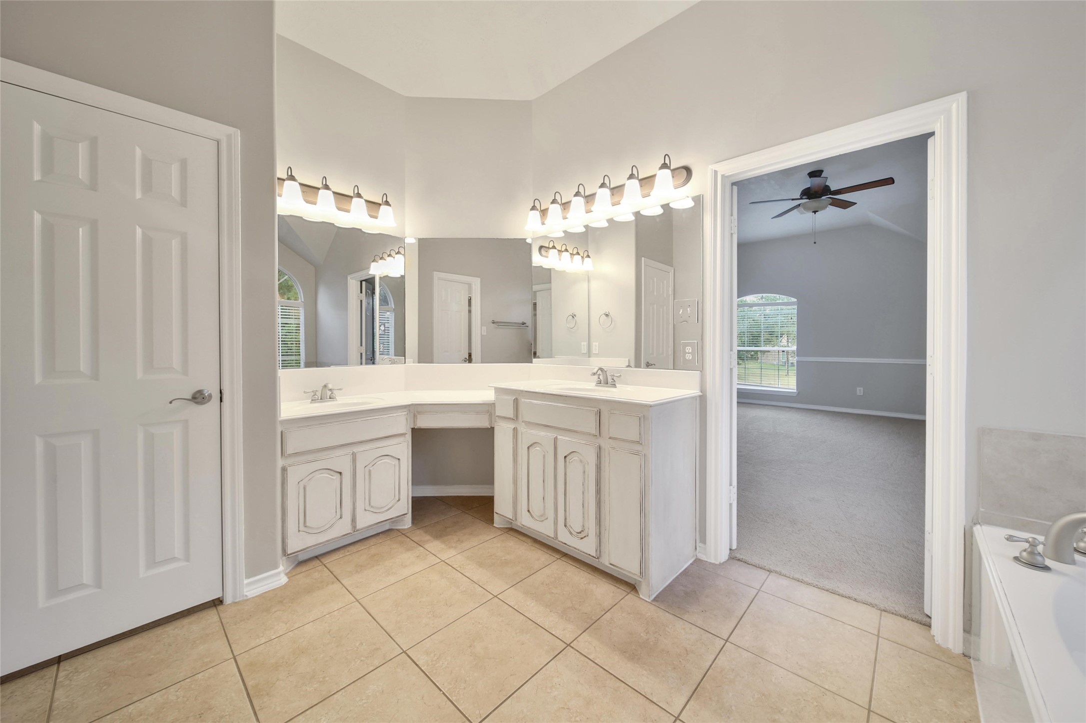 2315 Legends Gate Drive Spring, TX 77386 - Photo 28 of 50 a bathroom with a double vanity sink mirror and