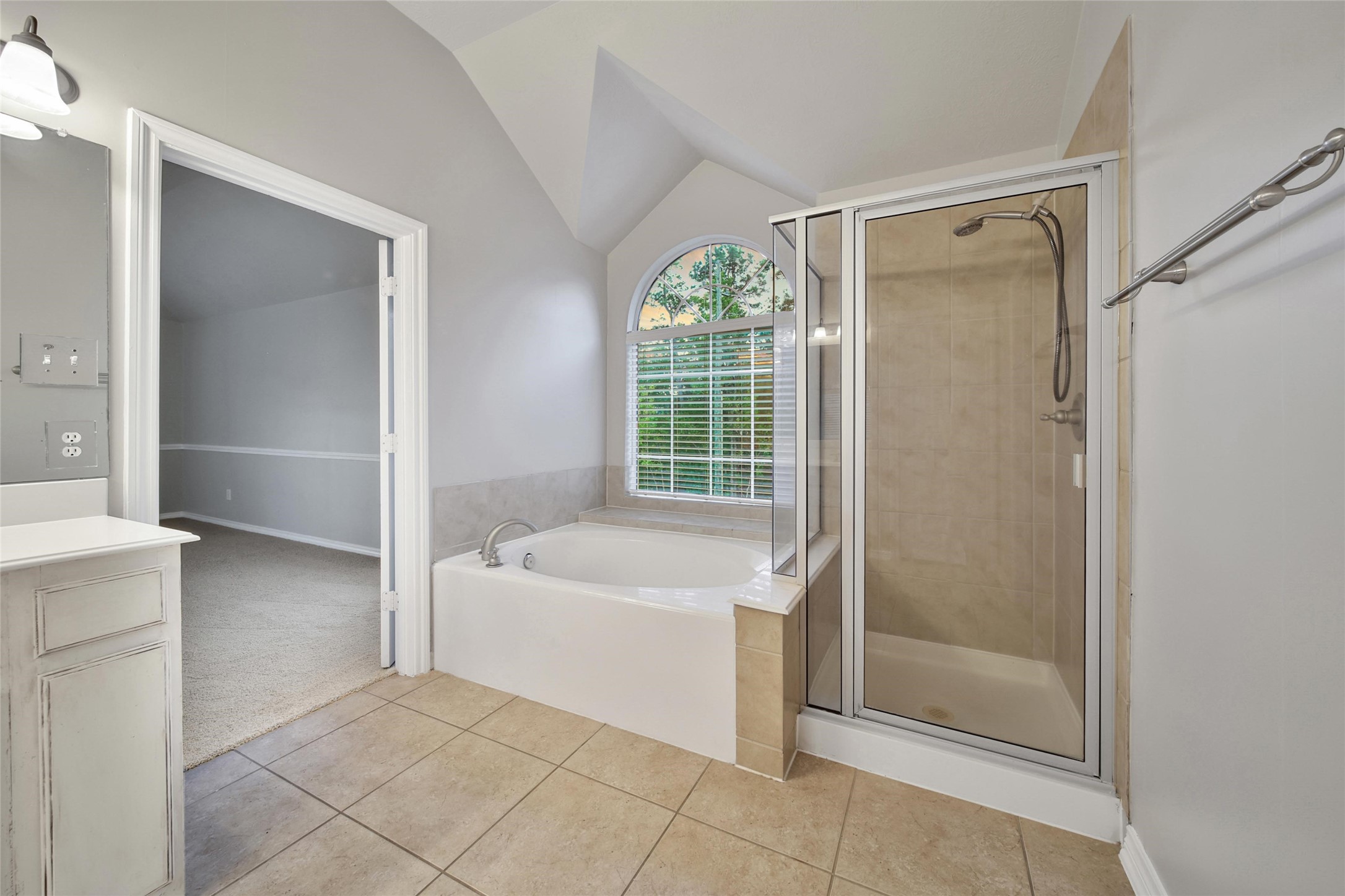 2315 Legends Gate Drive Spring, TX 77386 - Photo 29 of 50 a bathroom with a tub sink and shower