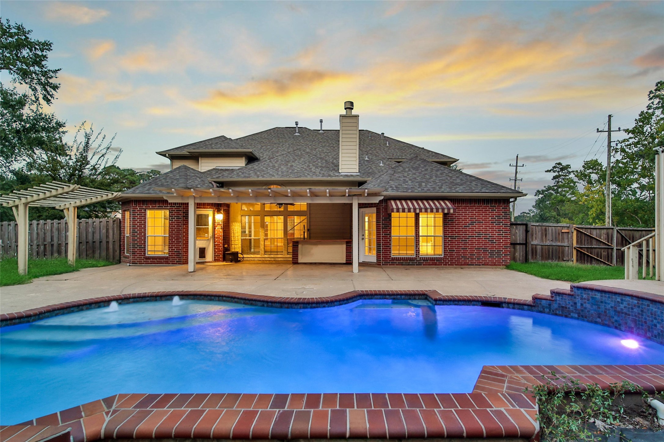 2315 Legends Gate Drive Spring, TX 77386 - Photo 38 of 50 a view of swimming pool with deck and a garden