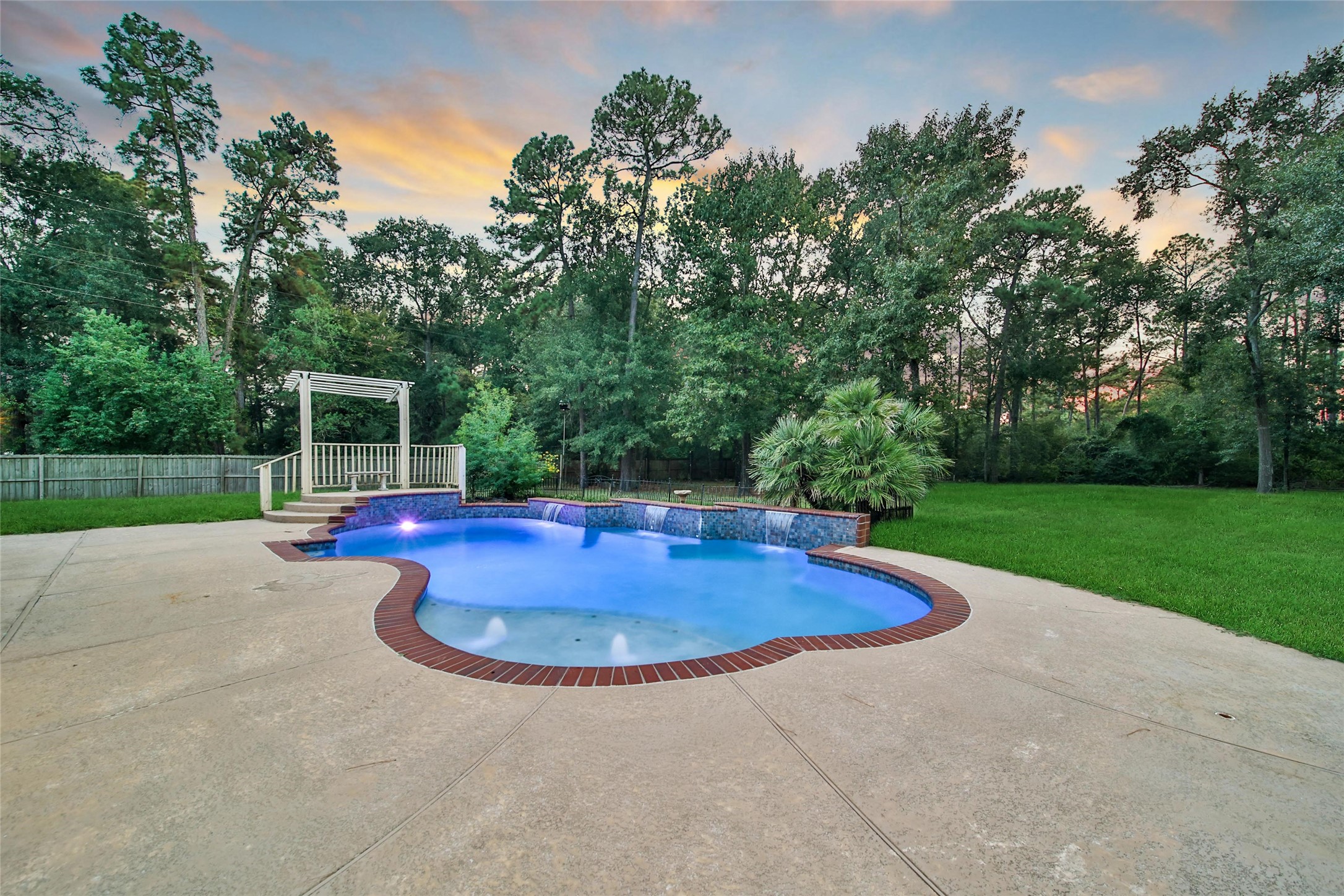 2315 Legends Gate Drive Spring, TX 77386 - Photo 44 of 50 a view of backyard with swimming pool and green space