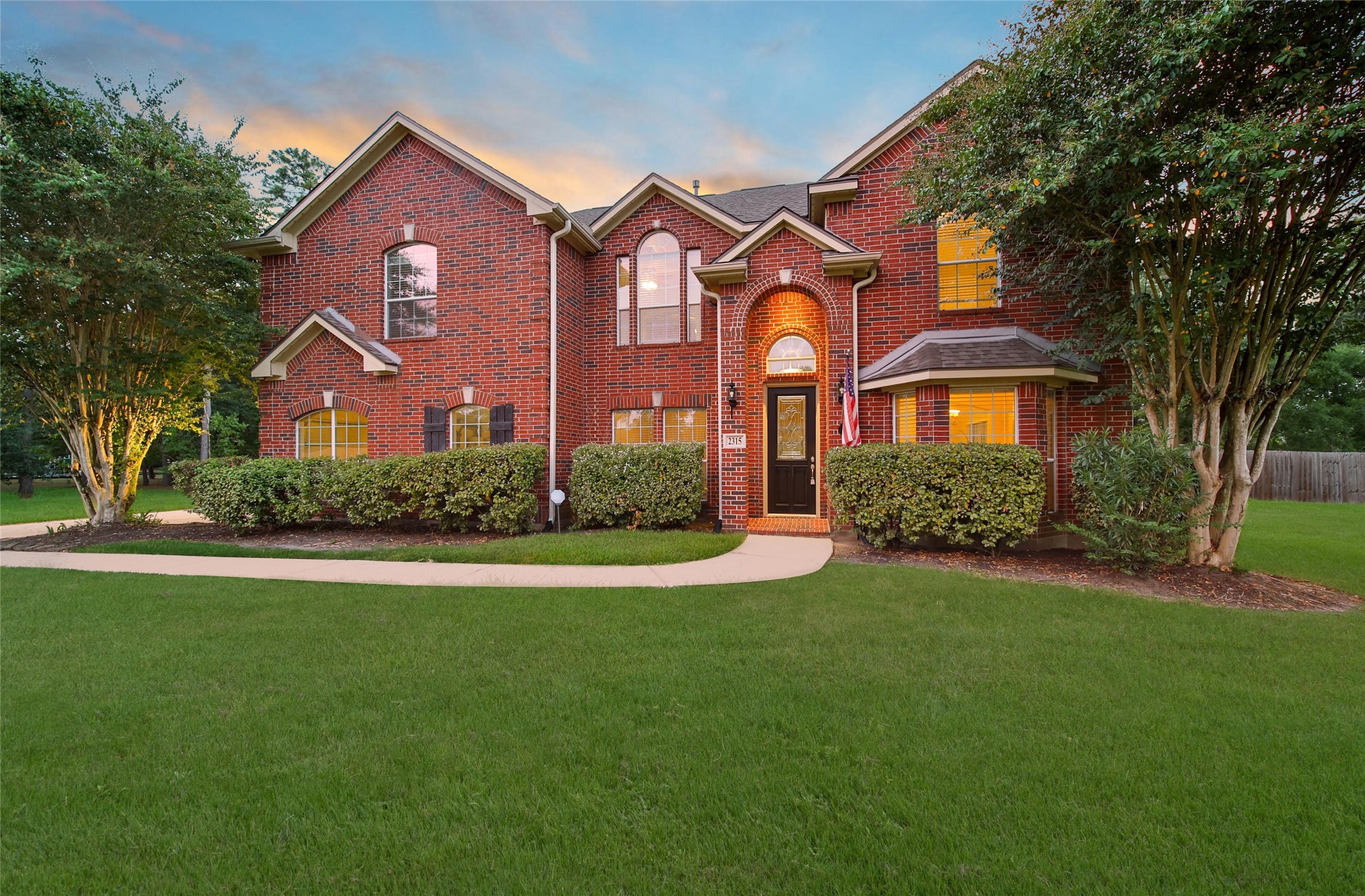 2315 Legends Gate Drive Spring, TX 77386 - Photo 49 of 50 a front view of a house with a yard