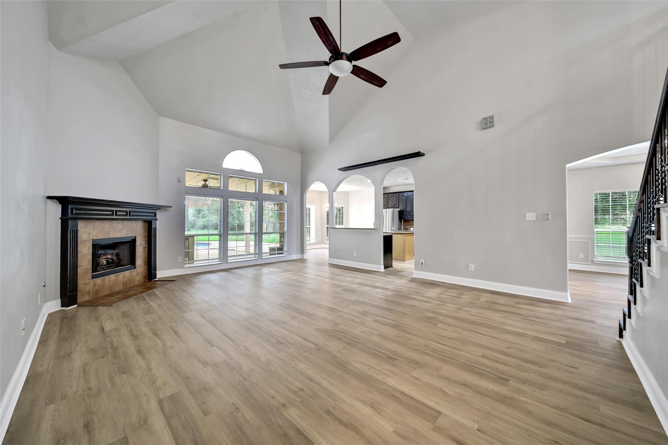 2315 Legends Gate Drive Spring, TX 77386 - Photo 7 of 50 wooden floor fireplace and windows in an empty room