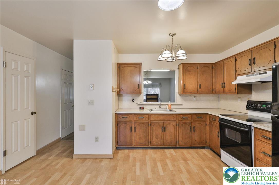 822 Elm Street Bethlehem, PA 18018 - Photo 12 of 40 a large kitchen with a sink and dishwasher stove