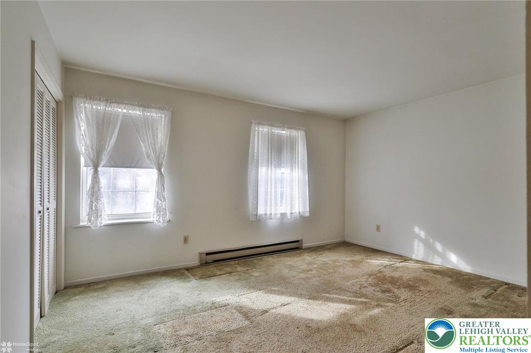 822 Elm Street Bethlehem, PA 18018 - Photo 18 of 40 an empty room with windows