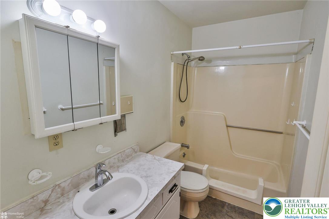 822 Elm Street Bethlehem, PA 18018 - Photo 27 of 40 a bathroom with a sink toilet and shower