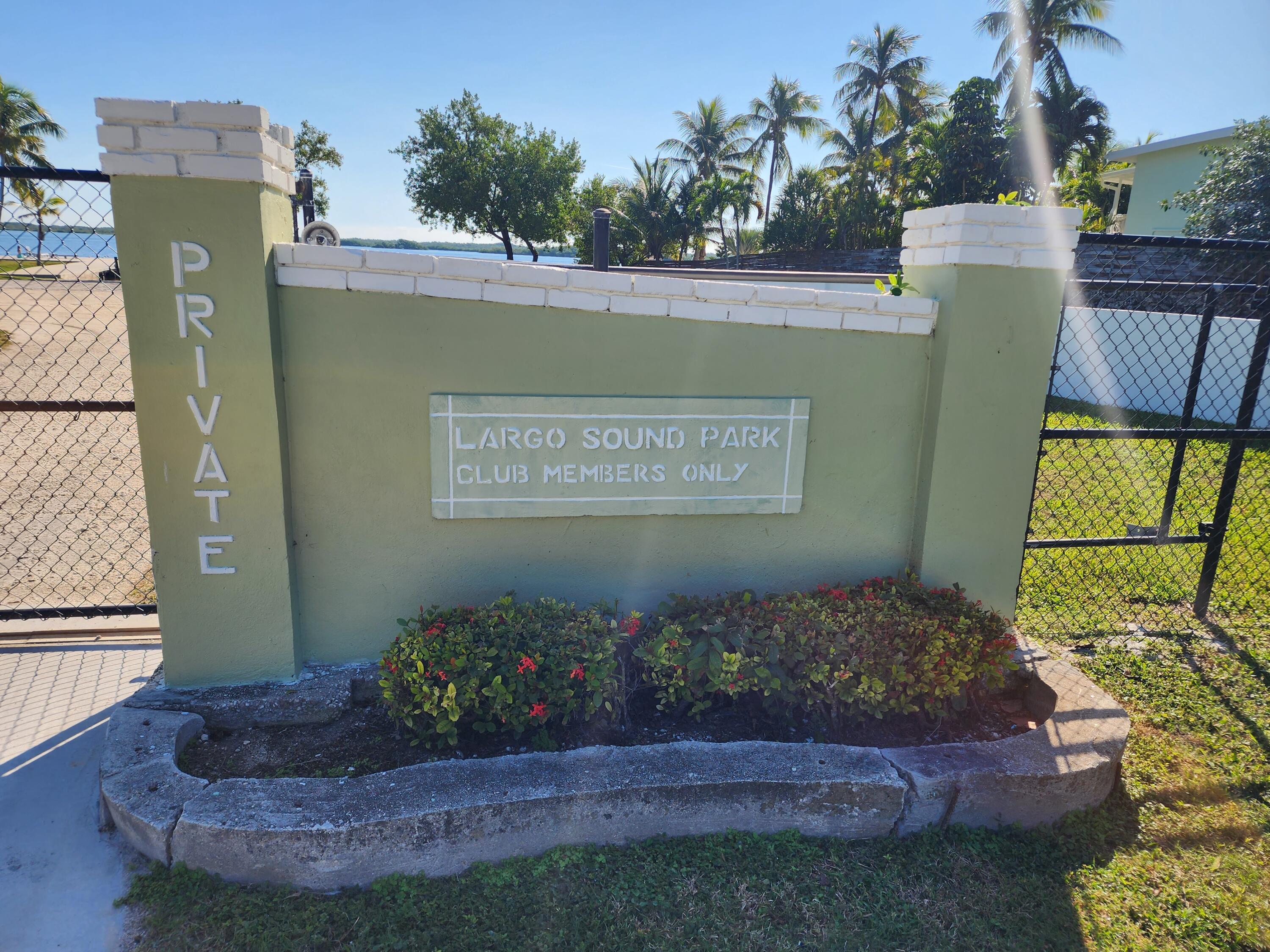 62 Southeast Marlin Avenue Key Largo, FL 33037 - Photo 14 of 14 a view of a back yard of the house