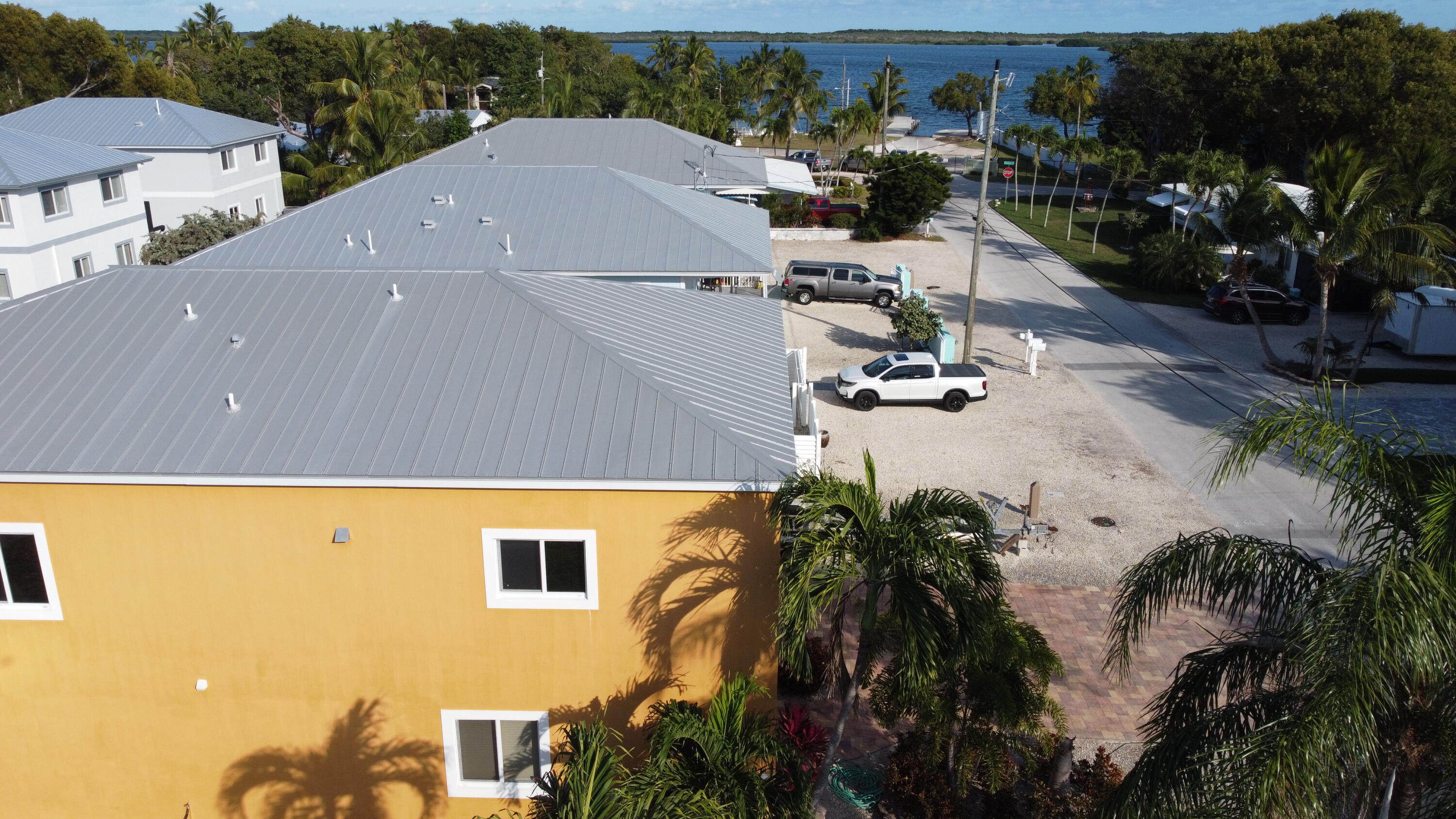 62 Southeast Marlin Avenue Key Largo, FL 33037 - Photo 6 of 14 a view of a house with a yard