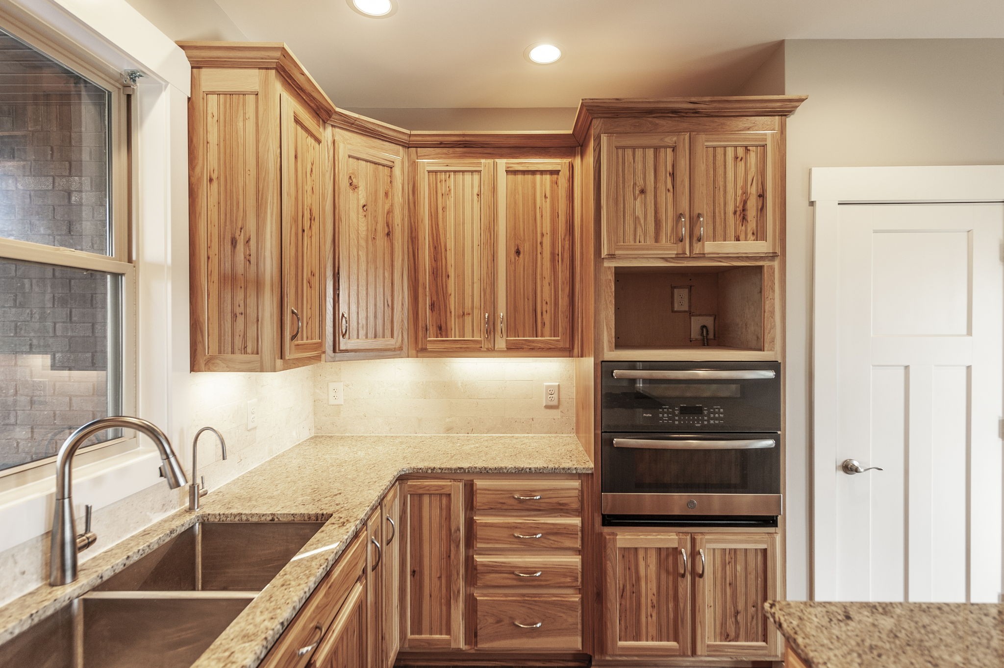 7728 Boyles Road White House, TN 37188 - Photo 29 of 60 a kitchen with stainless steel appliances granite countertop a stove a sink and a microwave