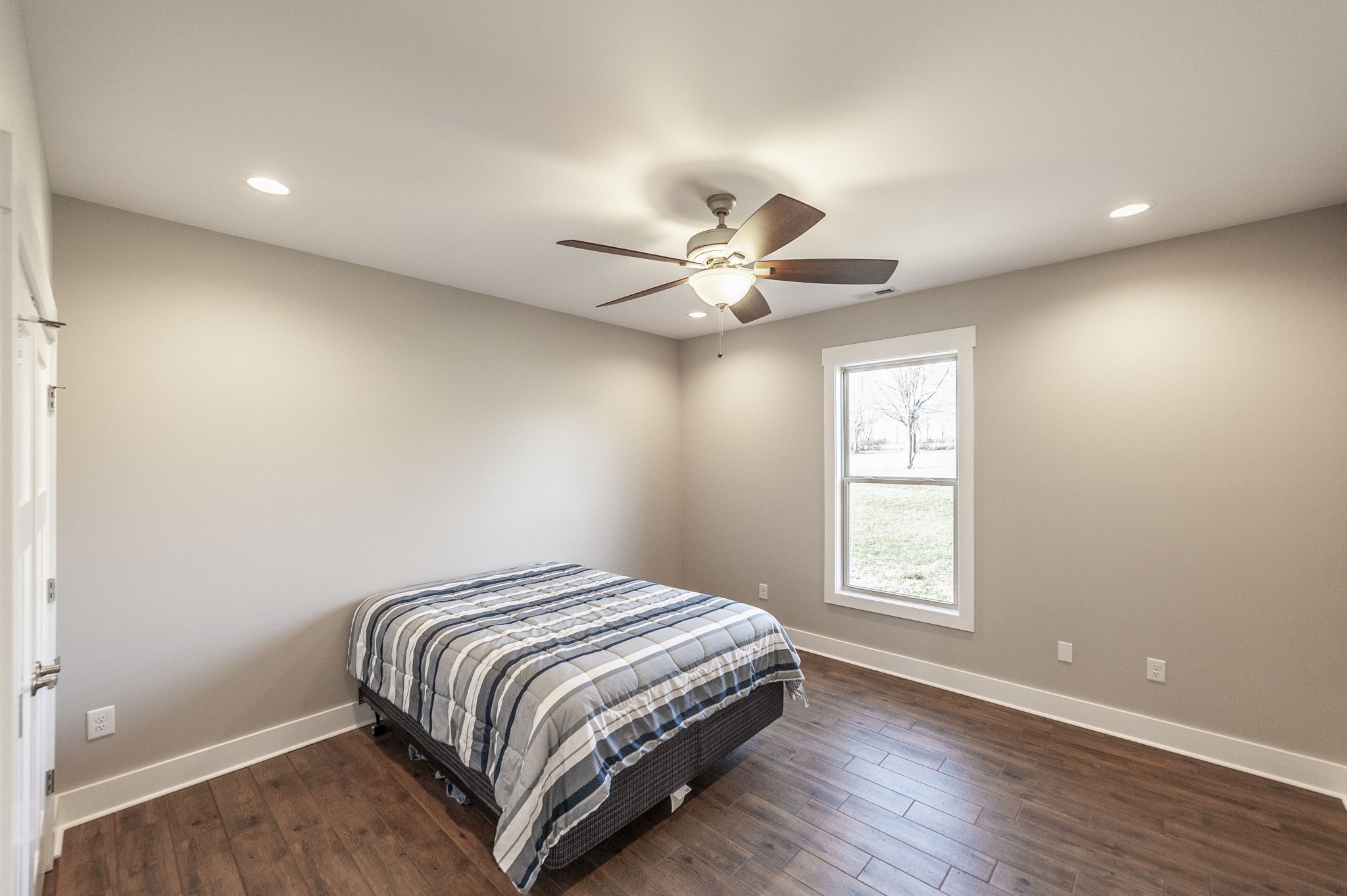 7728 Boyles Road White House, TN 37188 - Photo 48 of 60 a bedroom with a large bed and a window