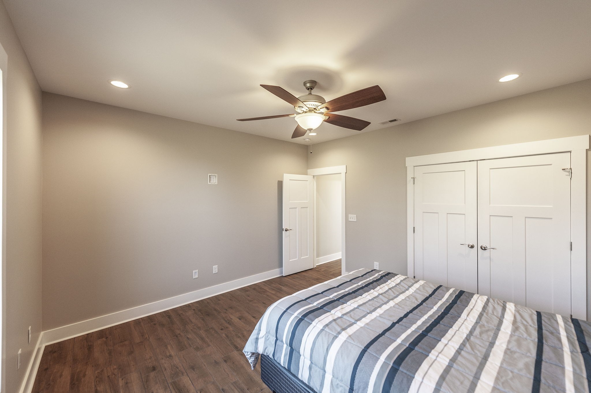 7728 Boyles Road White House, TN 37188 - Photo 49 of 60 a bedroom with bed and a ceiling fan