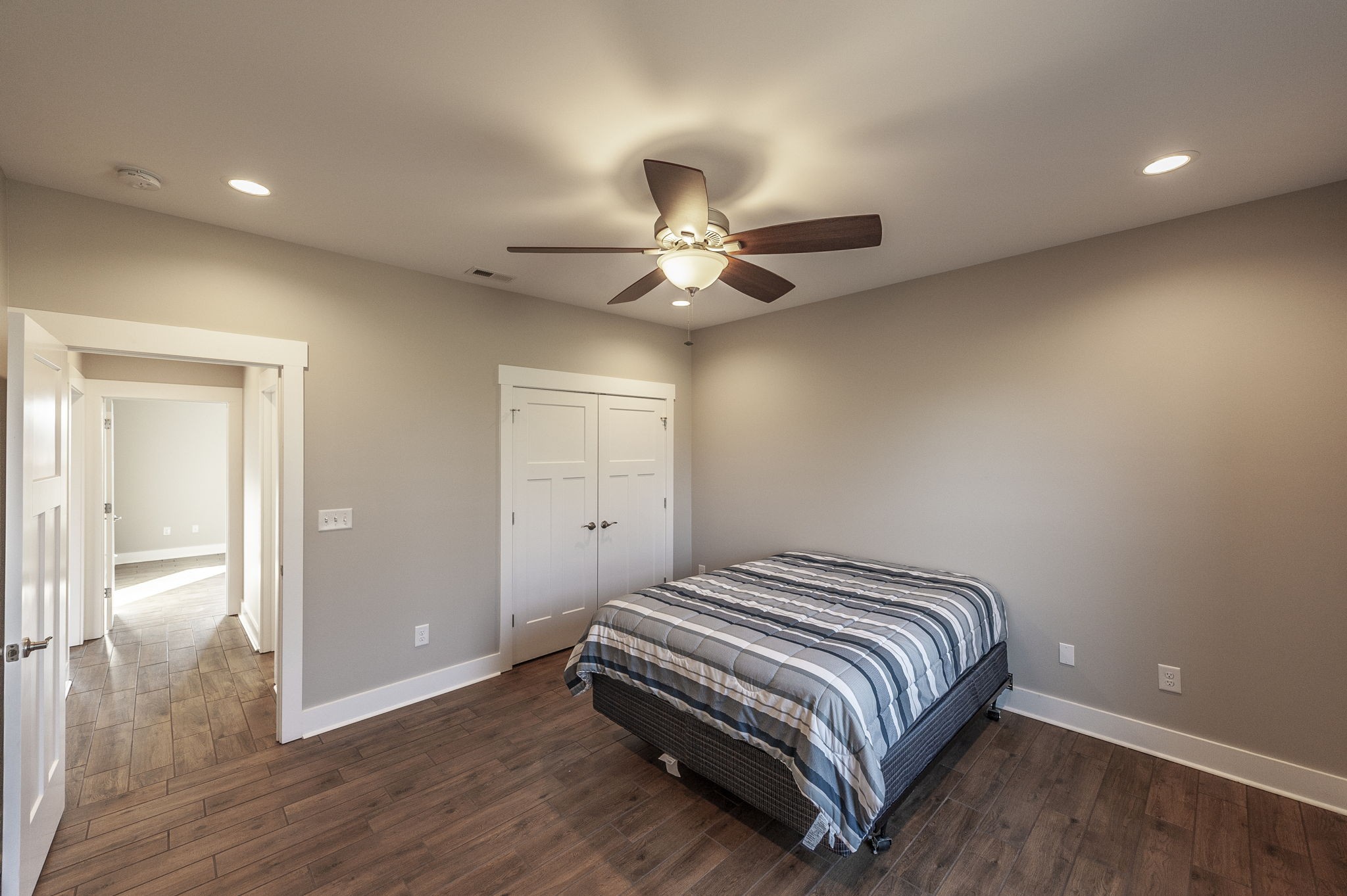 7728 Boyles Road White House, TN 37188 - Photo 50 of 60 a bedroom with a bed and a ceiling fan