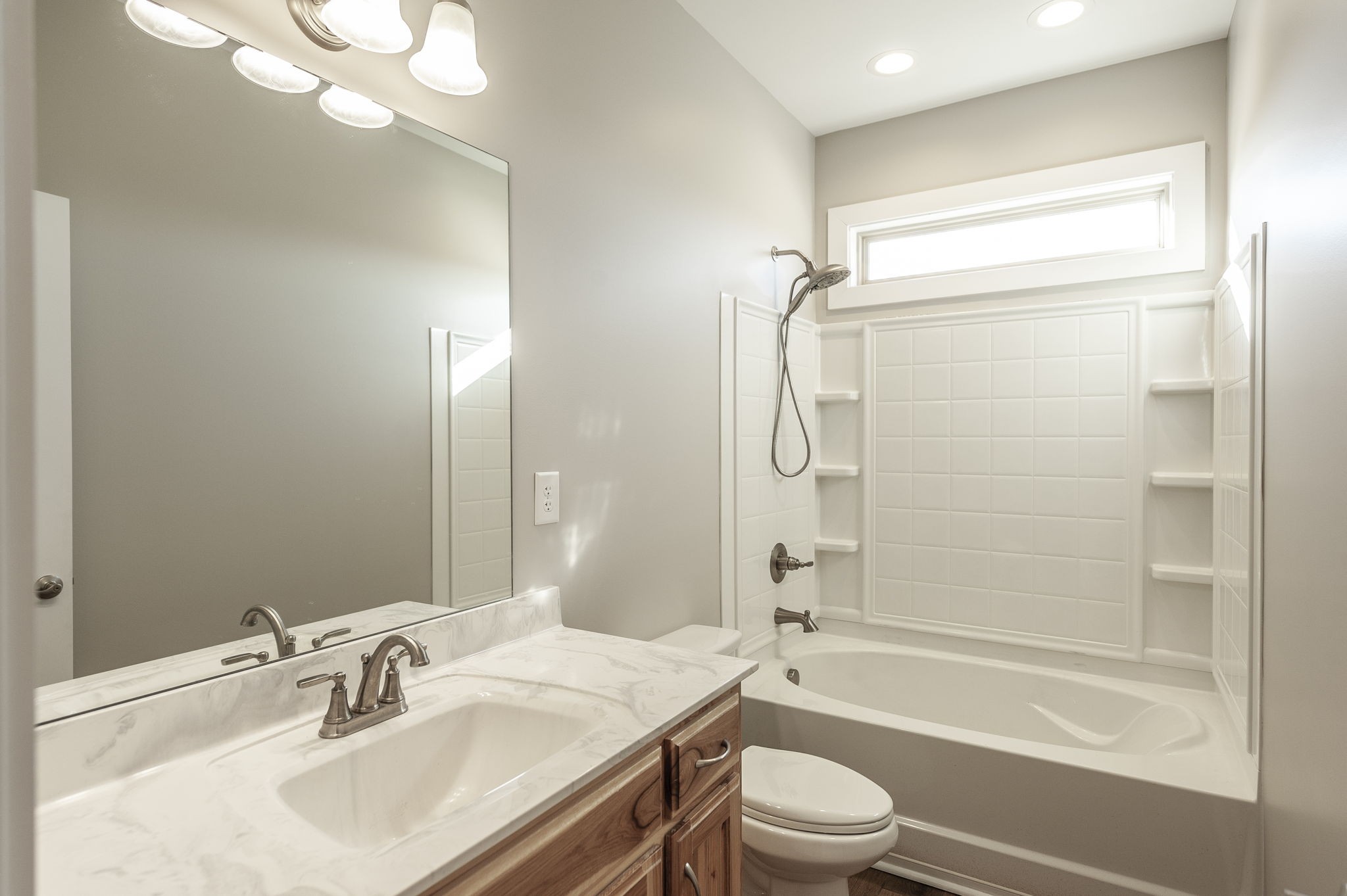 7728 Boyles Road White House, TN 37188 - Photo 53 of 60 a bathroom with a sink a toilet and shower
