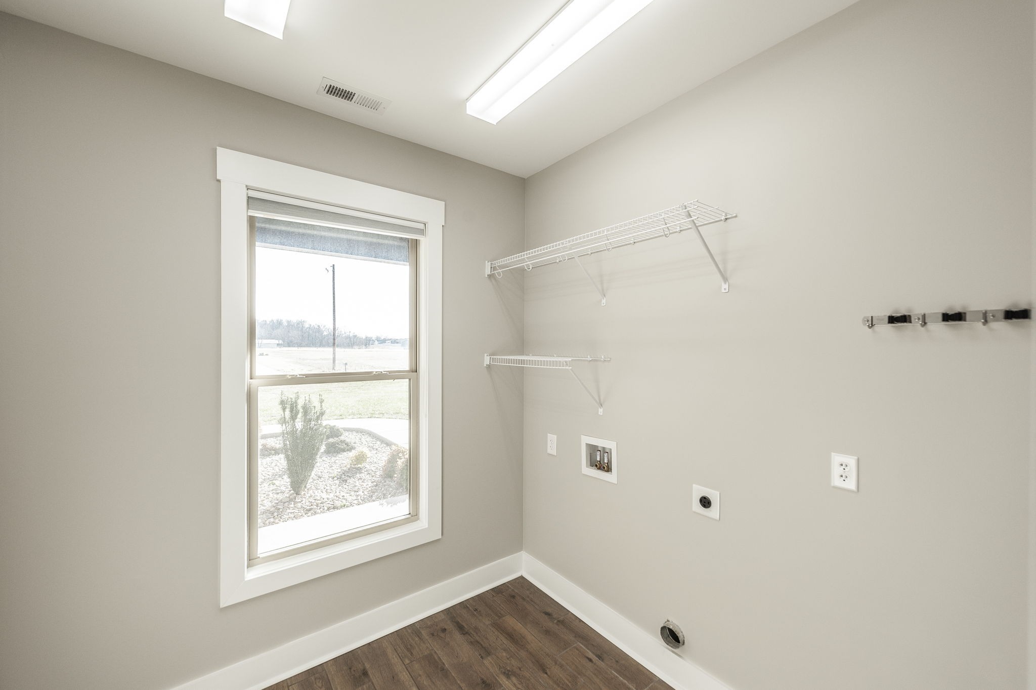 7728 Boyles Road White House, TN 37188 - Photo 56 of 60 a view of an empty room with wooden floor and a window