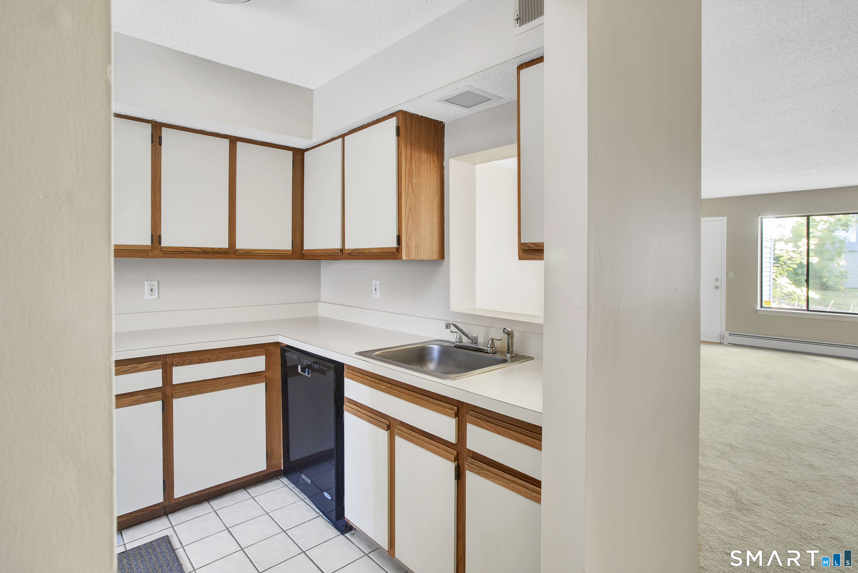 9 Talcott Forest Road, Unit C Farmington, CT 06032 - Photo 6 of 20 a kitchen with a sink cabinets and appliances
