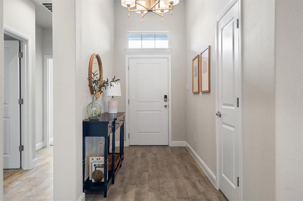 1864 Mensa Drive Haslet, TX 76052 - Photo 7 of 40 a view of entryway with livingroom