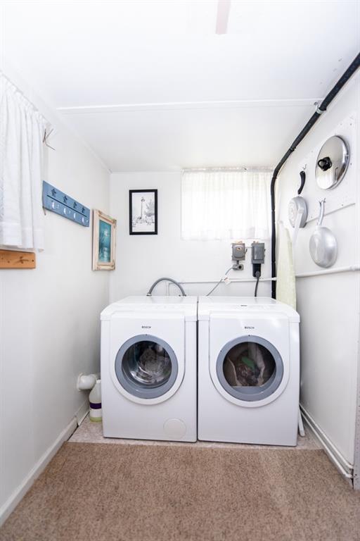 949 Lyn Road Sarver, PA 16055 - Photo 14 of 25 Laundry/utility area. The furnace & hot water tank are located along the right wall. There is storage along the left wall.