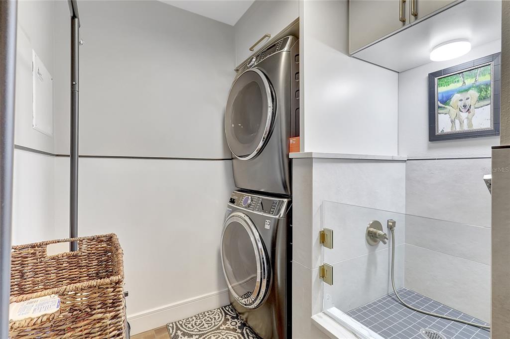 610 Riviera Dunes Way, Unit 602 Palmetto, FL 34221 - Photo 36 of 79 a utility room with dryer and washer