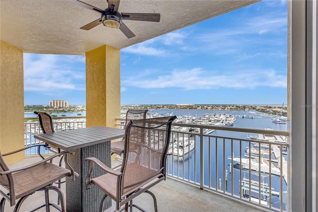 610 Riviera Dunes Way, Unit 602 Palmetto, FL 34221 - Photo 56 of 79 a view of a balcony with furniture