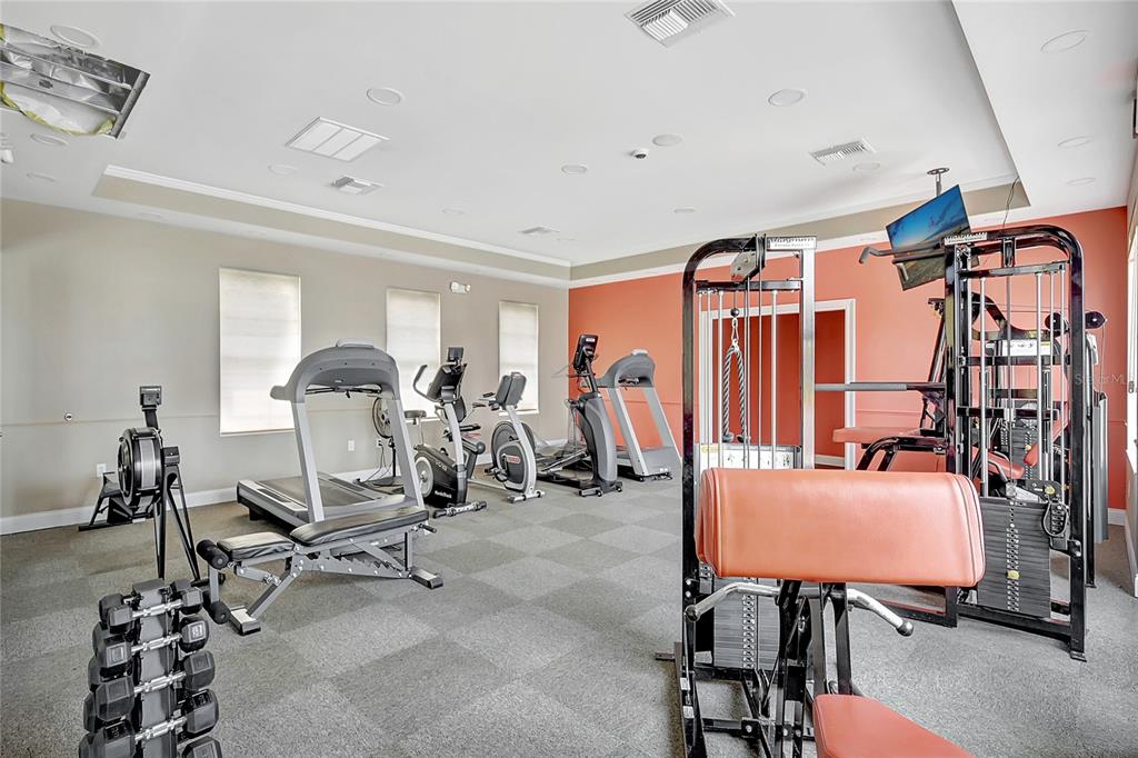610 Riviera Dunes Way, Unit 602 Palmetto, FL 34221 - Photo 59 of 79 a view of a room with gym equipment